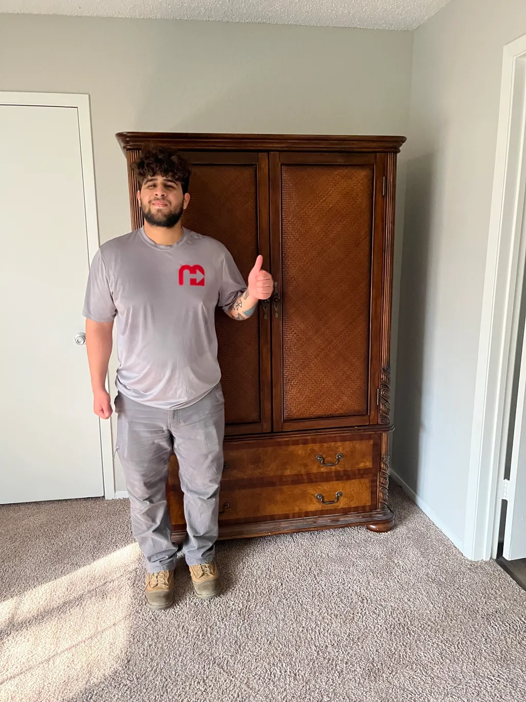 Monolith crew hauling junk from a Naperville basement out to the truck