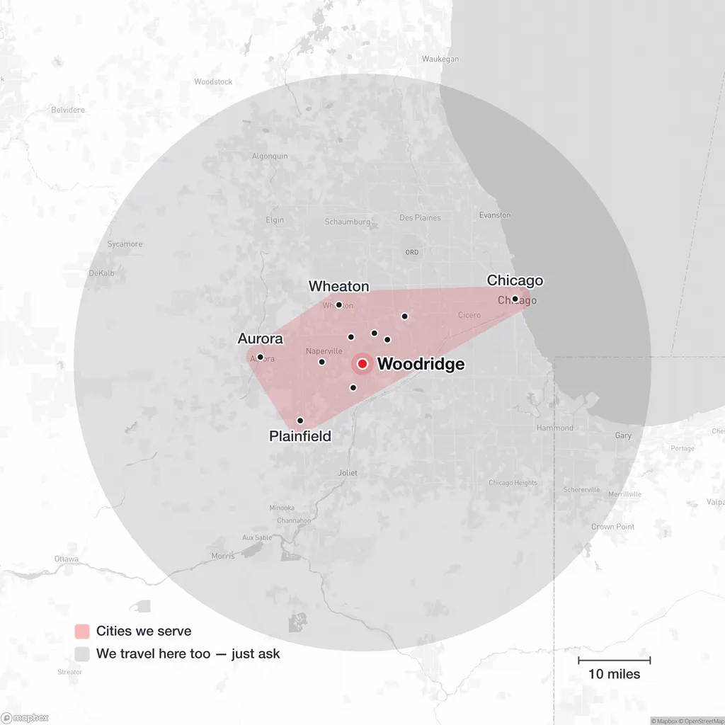 Map of Monolith Moving Company's service area, centred on Woodridge, Illinois: the named cities from Aurora east to Chicago, inside a wider 40-mile radius covering the rest of Chicagoland.